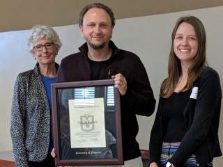 Professor David Schulz (center) with his student Abigail Beckerdite (right) and Ann Covington (left), the award’s namesake.